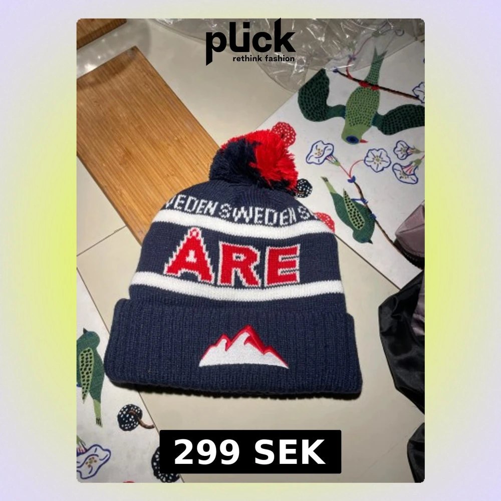 Mörkblå åre Mössa Med Tofs | Accessoarer