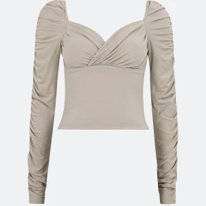 NY aldrig använd tröja från BIKBOK - Säljer denna helt nya och aldrig använda tröja från BikBok då jag ej hann lämna tillbaka. Lappen sitter kvar. Storlek XS och formar sig fint på kroppen.