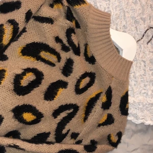 Stickad tröja - Storlek Xs