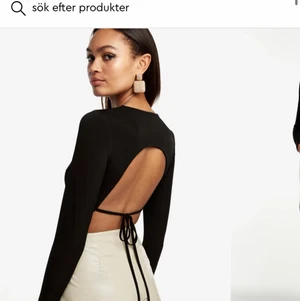 Body  - Oanvänd body med öppen rygg (prislappen är kvar) 