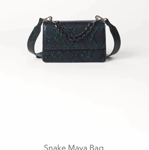 Väska - Slutsåld väska från BECKSÖNDERGAARD i nytt skick. 