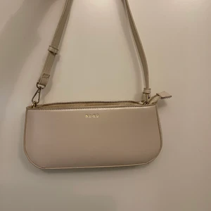 Axelremsväska nakd  - Väska från nakd.