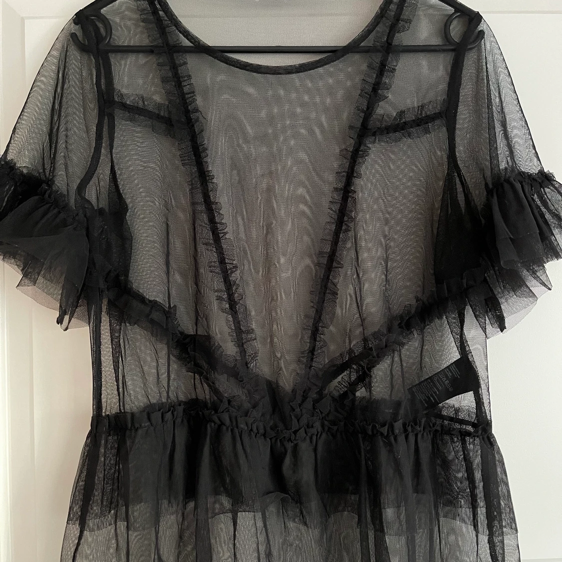 Svart seethrough topp