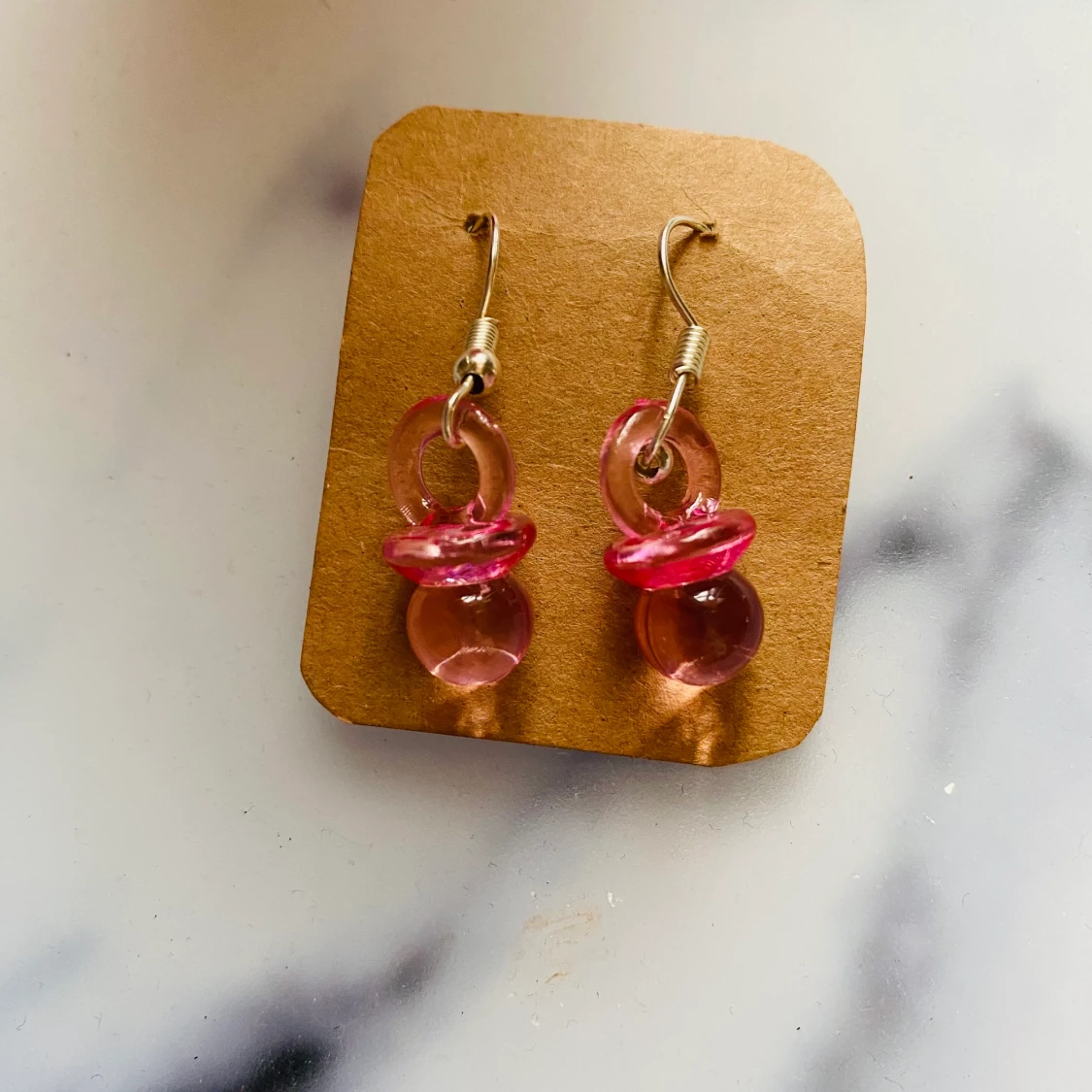 Napp örhängen rosa