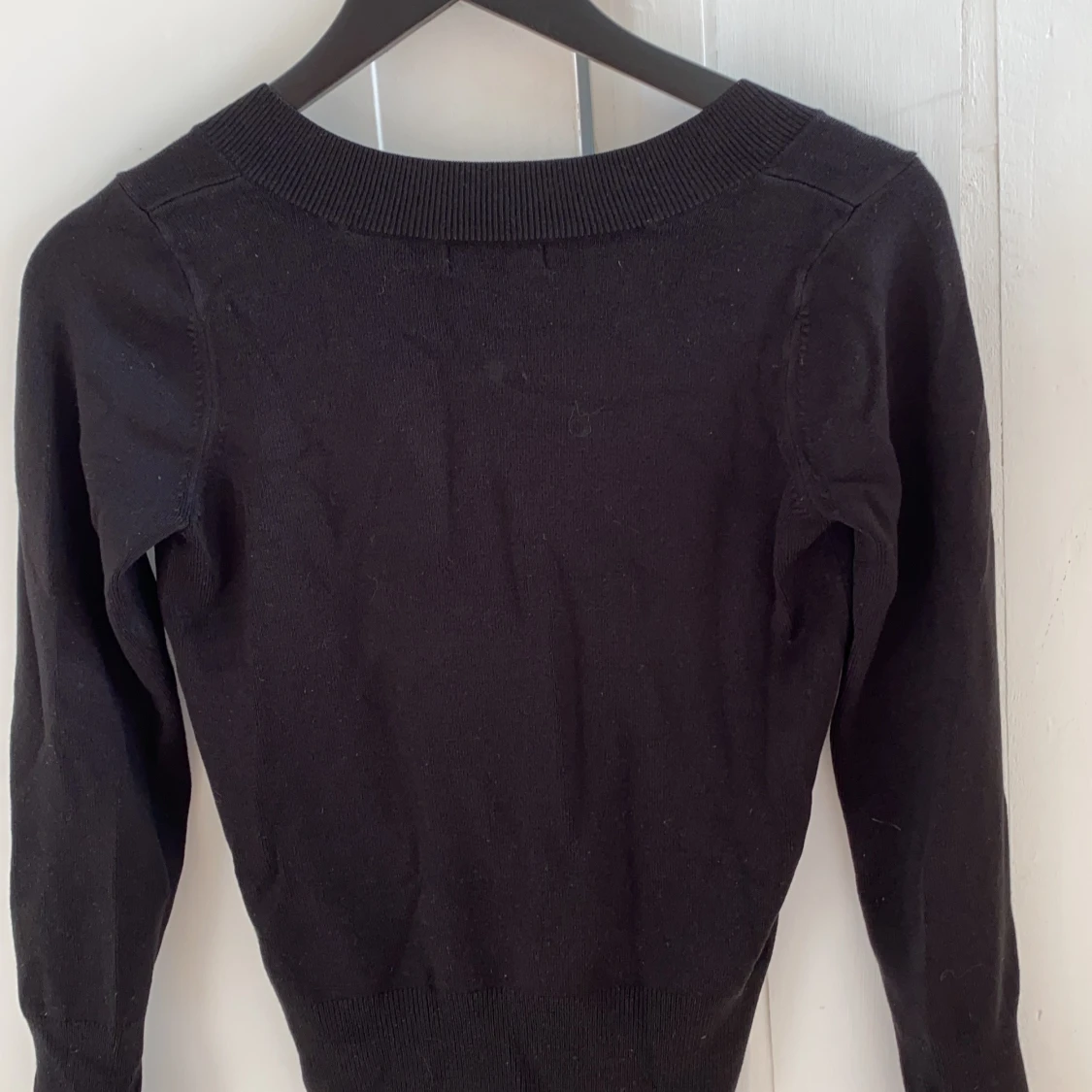 En svart pullover - 90