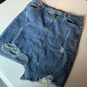 En riktig sommar kjol passar till allt materialet är då jeans material stretch 