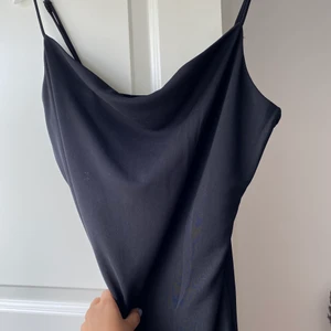 Figurnära festklänning - En svart super sexig klänning, använts 1 gång. 