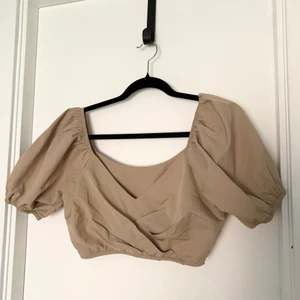 Milkmaid topp  - Köpt från Nelly men har aldrig använt. Skick som ny. Finns en dragkedja i sidan. 