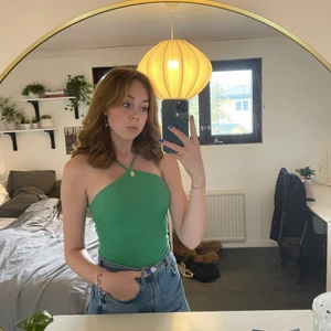 Grön topp - Grönt linne från GinaTricot som är i storlek XS💚