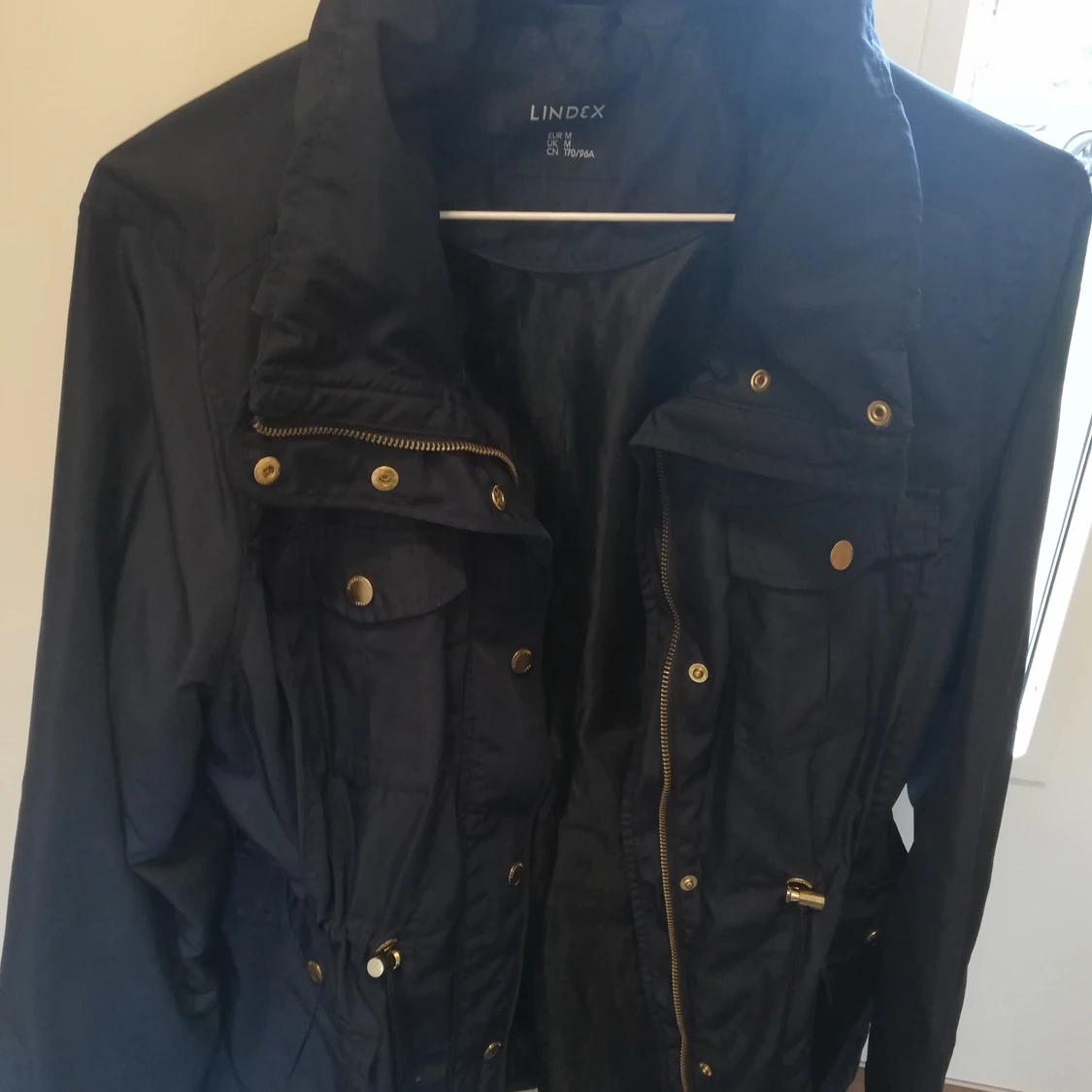 Tunnare mörkblå jacka - 90