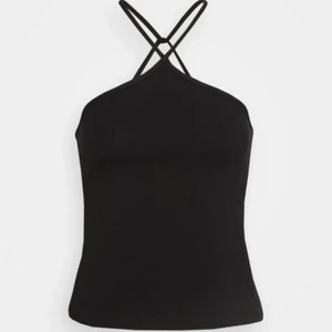 Linne med korsad urigning - Ett linne med korsad urigning i från weekday, använt ett fåtal gånger. Fortfarande bra skick. 