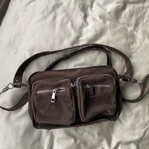 Dark green bag with silver details