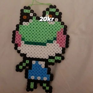 Lily halsband  - Lily från animal crossing. Bandet är pastell grönt. Möts upp i Östersund eller postar