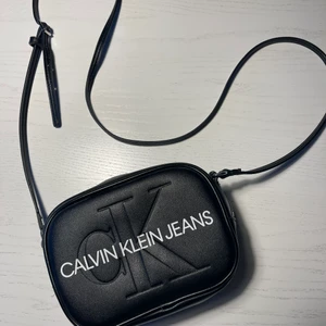 Calvin Klein väska - En svart Calvin Klein väska bra skick