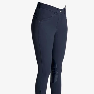 Ridbyxor - Snygga, knappt använda marinblåa ridbyxor från CRW. Köpta 2017, använda cirka 2 veckor sedan la jag av med ridningen - så dom är i gott skick! Halvskodda med gummifäste. Storlek 38 men kan även passa en 36a. 