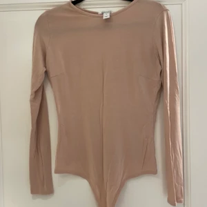 Body - ”Gammelrosa” body från Nelly i storlek S. Väldigt skönt material. Frakt ingår ej i priset💓