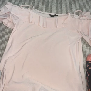 off the shoulder top - been worn a few times , good condition , size 12 , stretchy material , will accept reasonable offers