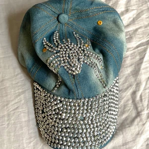 spindelkeps - spindelkeps med blingbling, några stenar saknas