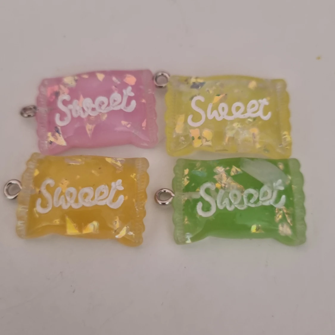 Fyra sweet-berlocker