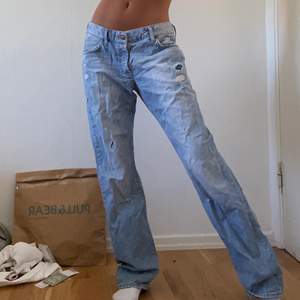 Baggy jeans med slitningar