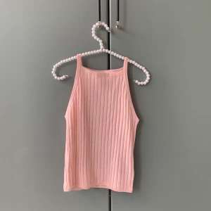 Rosa linne - Persikofärgat linne med fin passform.