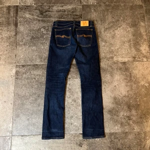 Flared Nudie Jeans  - Sjukt feta vintage nudie som sitter slim med en liten flare, sitter som en 30/32 och förutom lappen som är borttvättad är de i riktigt bra skick👏