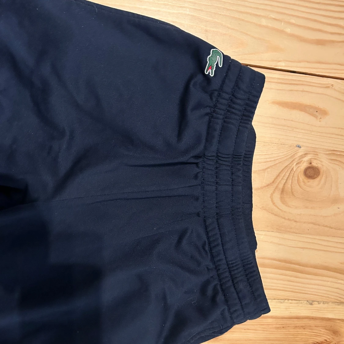 Mörkblå träningsbyxor Lacoste Sport - 1