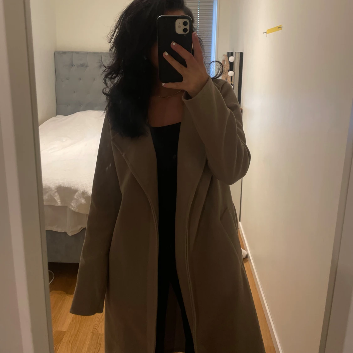 Brun kappa med bälte