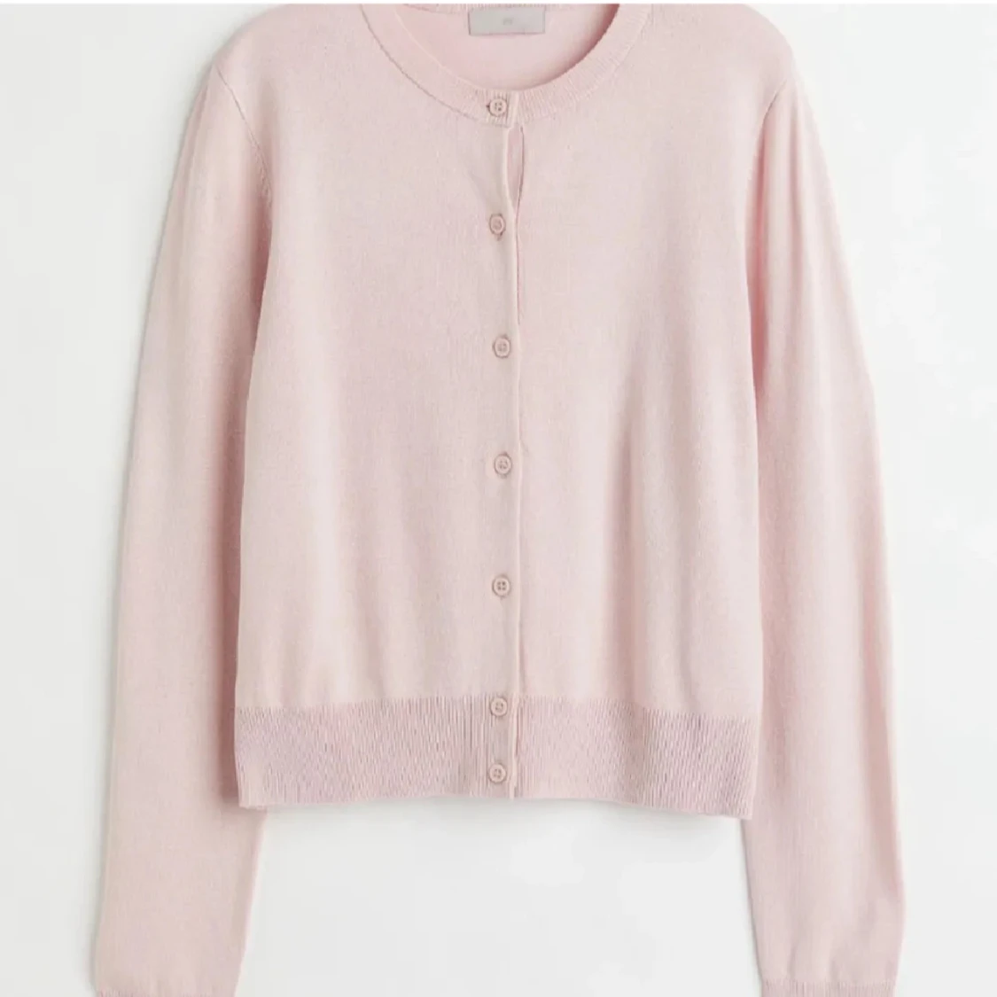 Ljusrosa kofta från H&M