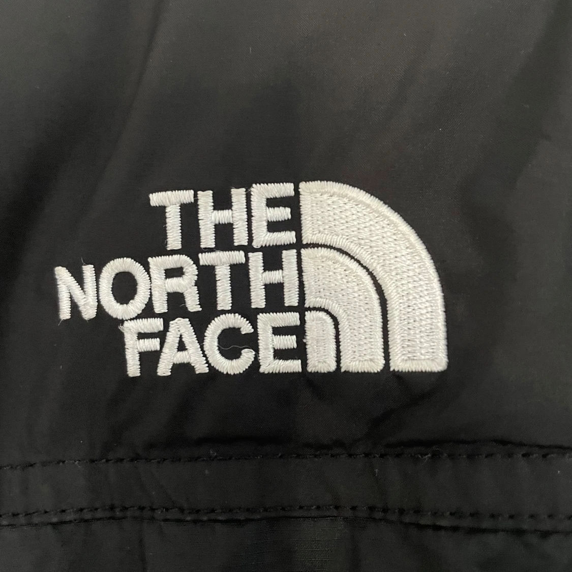 Svart pufferjacka från The North Face - 2