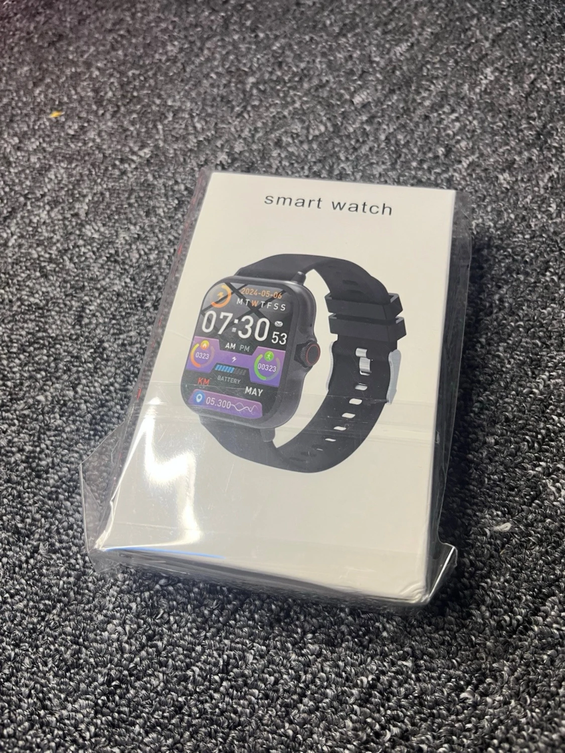 Svart smartklocka med silikonarmband