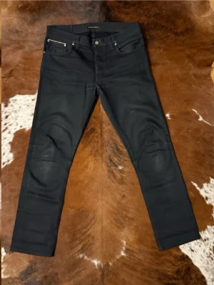 Selvage nudie GrimTim - Tjena! Säljer dessa Selvage Nudie jeans i modellen GrimTim DryBlackSelvage, jeansen är i fint skick och i storlek W34/L34, hör av dig vid funderingar!🙌