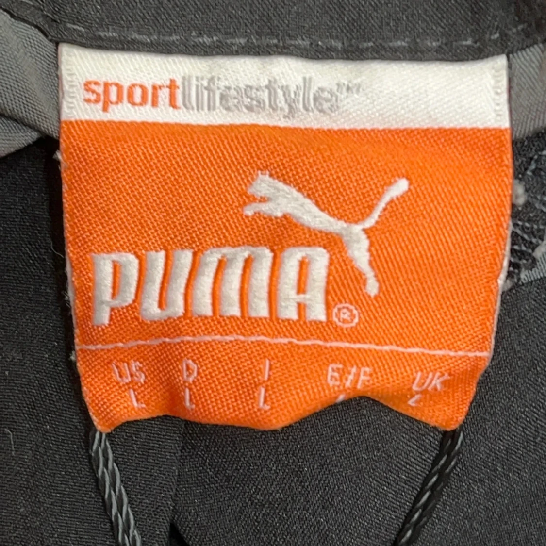 Svart vindjacka från Puma i storlek L - 2