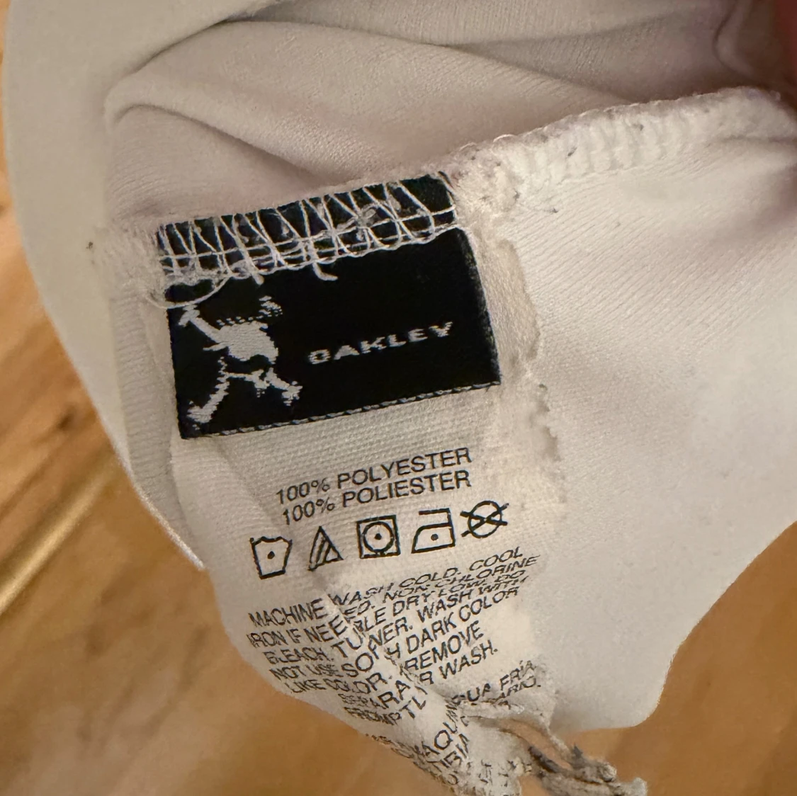 Vit sportig pikétröja från Oakley - 3