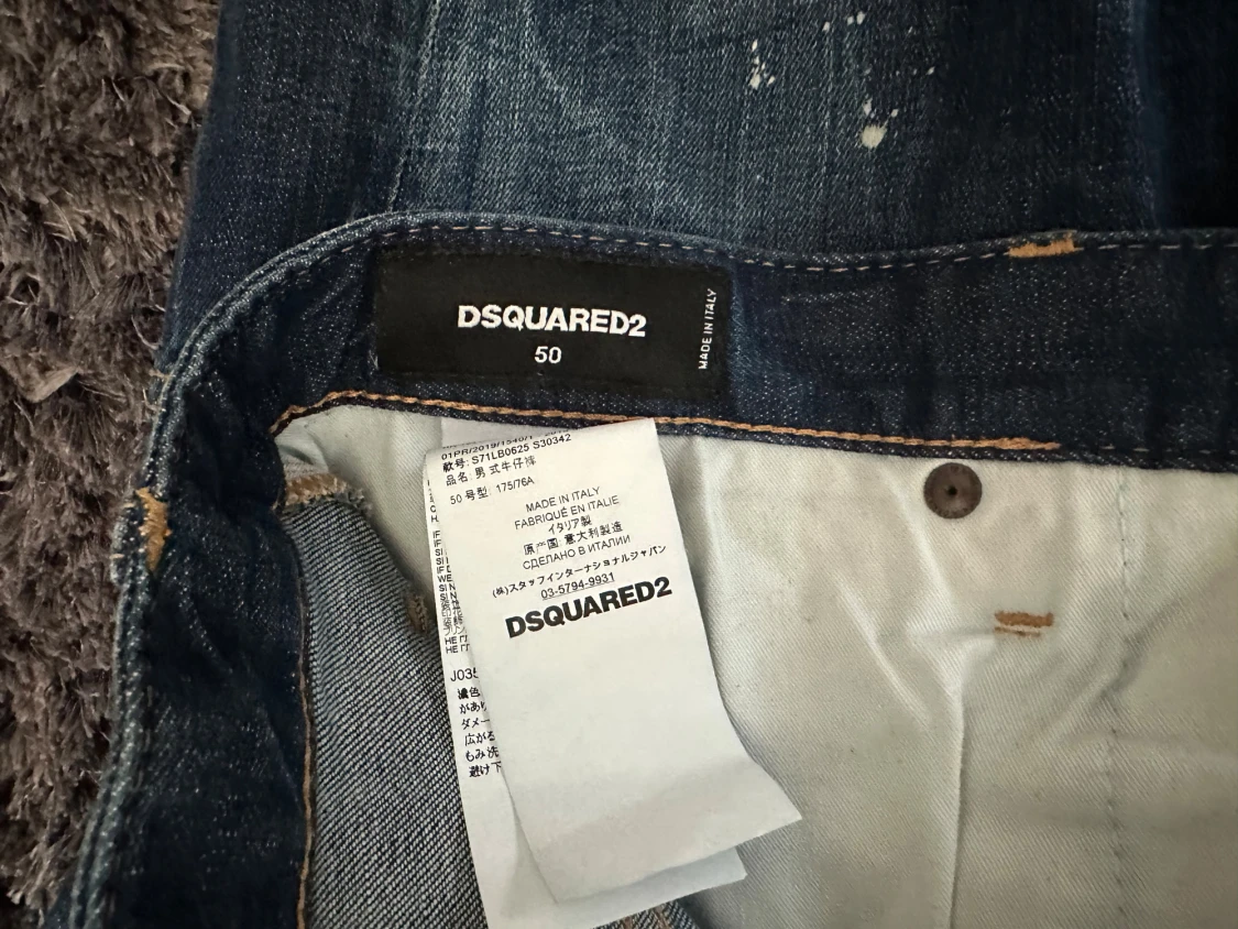 Dsquared2 blå jeans med färgstänk - 1