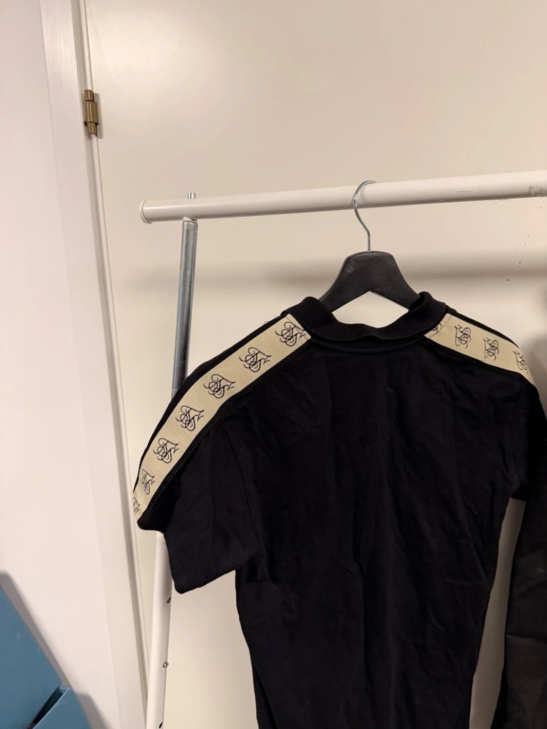 Svart polotopp från SikSilk - 1