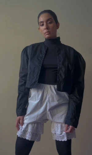 Vintage Silk Black Bolero Cropped Jacket - Vintage Silk Black Bolero Cropped Jacket. 100% Silk. Emrboidered Trim details & Puff Sleeves. Made in Austria. Very Good Condition. Model is 160cm (5”3) and generally fits S/M.  45 CM/ 17.7 IN Length 63 CM/ 24.8 IN Sleeve 40 CM/ 15.7 IN Shoulders 88 CM/ 34.6 IN Chest  