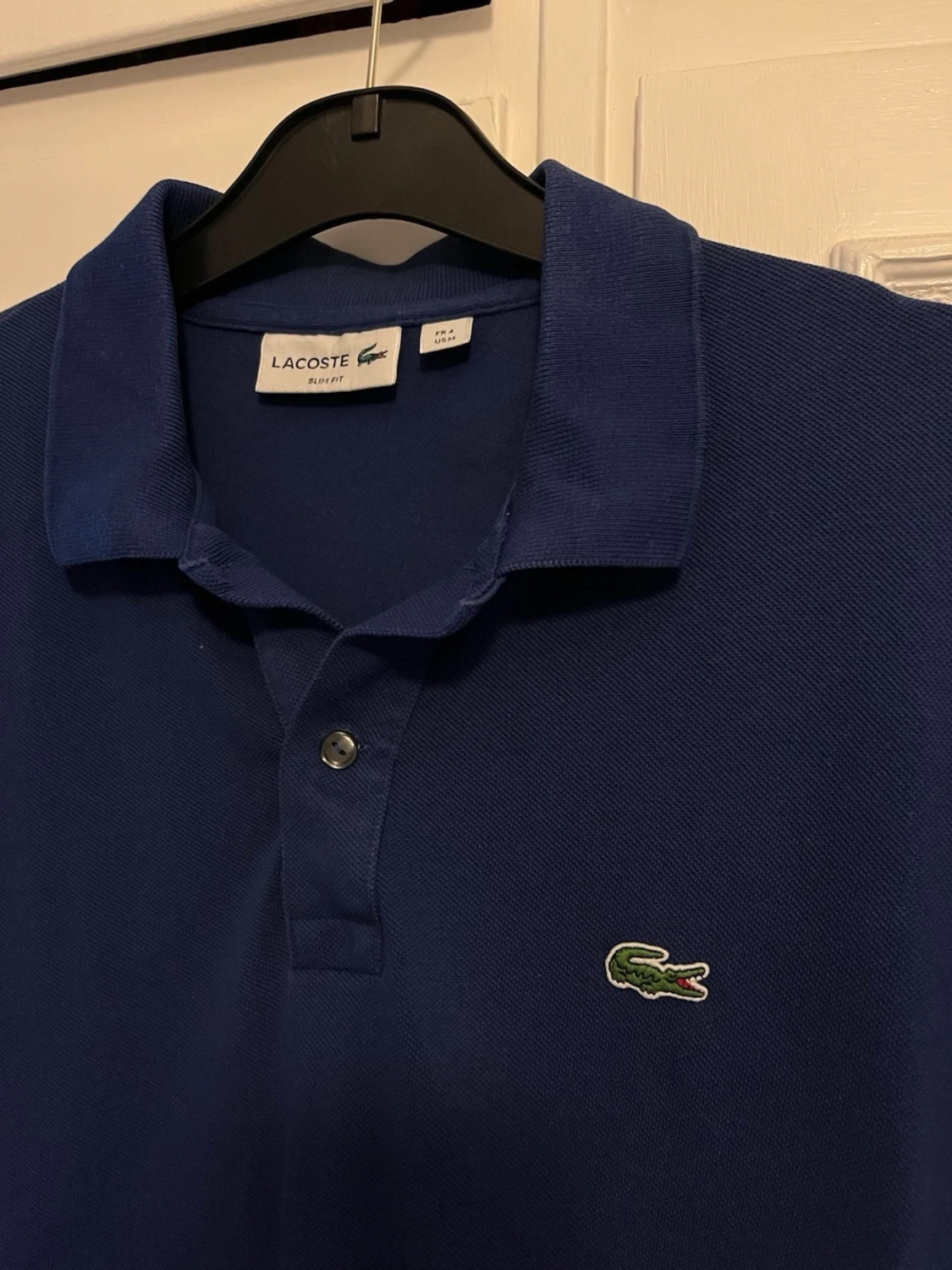 Marinblå pikétröja från Lacoste - 1