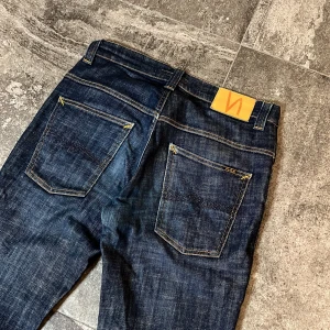 Vintage Dry Nudie Jeans - Sjukt feta nudies som är runt 15 år gammla och knappt använda🫡 31/34 - osäker på modellen men kan skicka bild på passformen vid behov👏