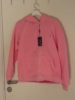 Polo Ralph lauren zipper  - Polo Ralph lauren zipper i rosa färg helt ny aldrig använd 