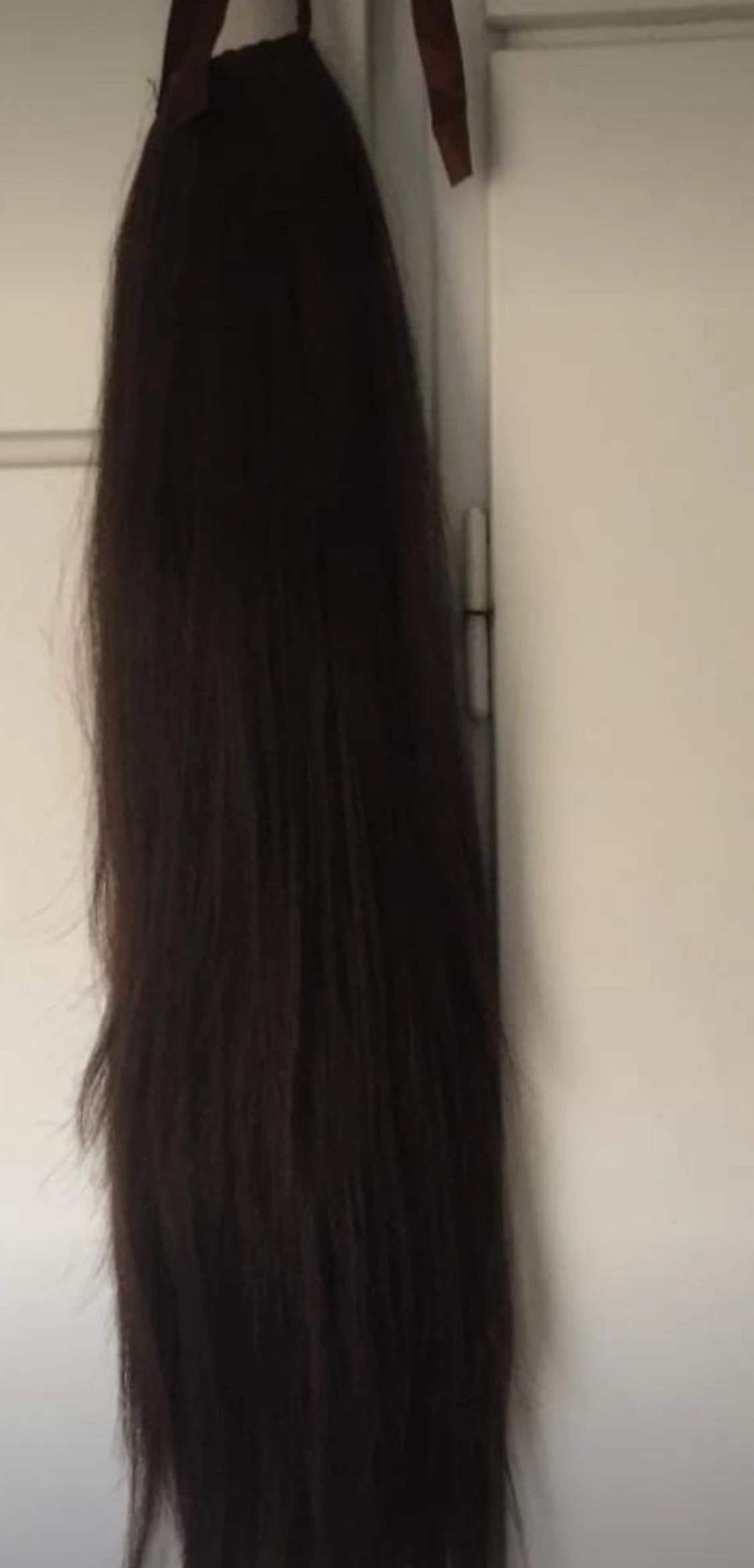 Mörkbrun clip-in hästsvans H&M - 3