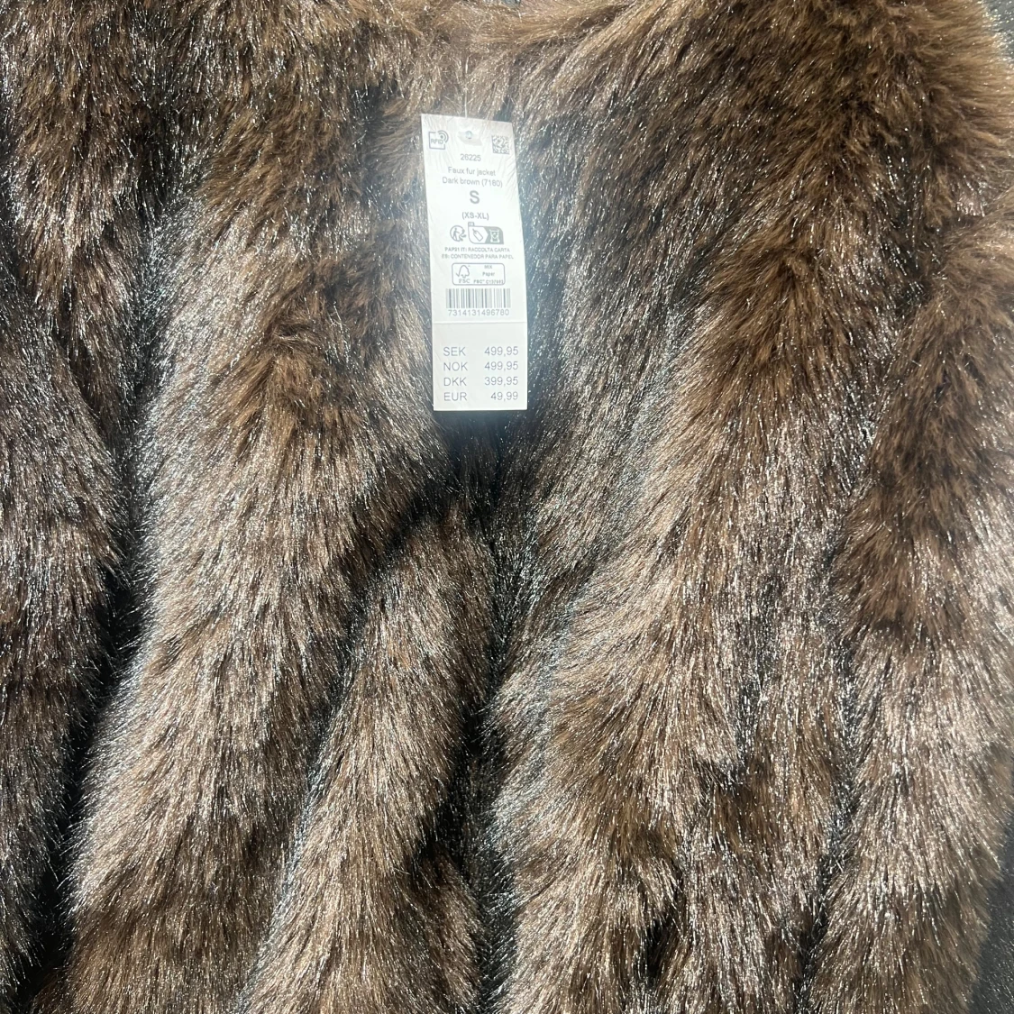 Brun pälsjacka i syntet S