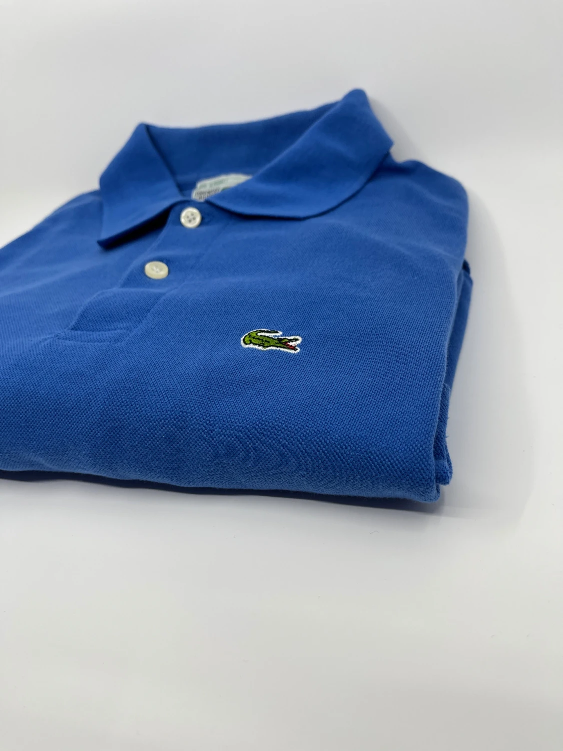 Blå polotopp från Lacoste - 2