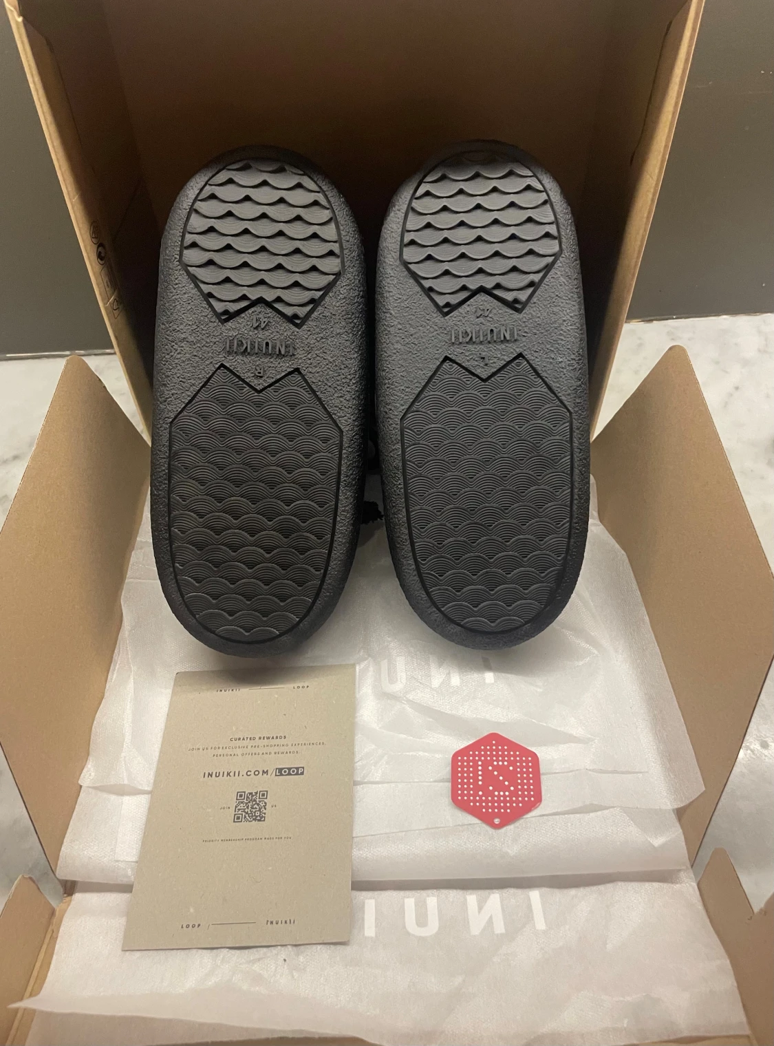 Svarta Inuikii skor - 2