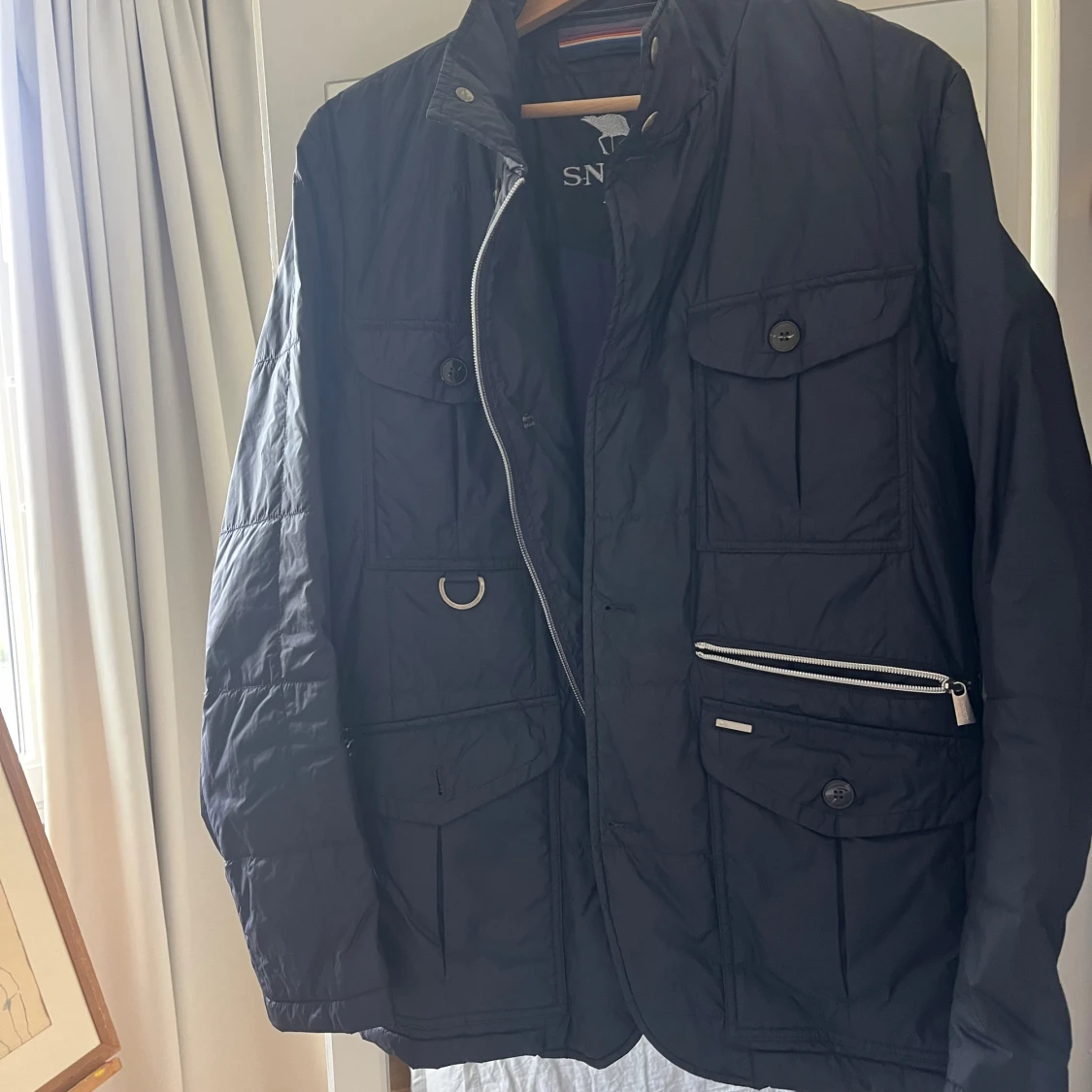 Mörkblå quiltad jacka från Snoot