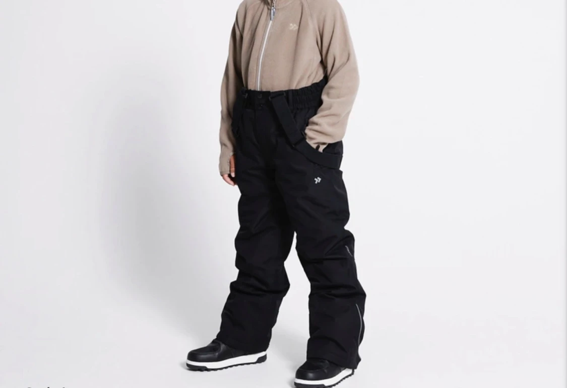 Svarta täckbyxor med hängslen