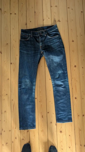 Nudie jeans Dry grim tim slim fit sjuka fades - Galna fades som kommit med tiden. Växt ur de tyvärr
