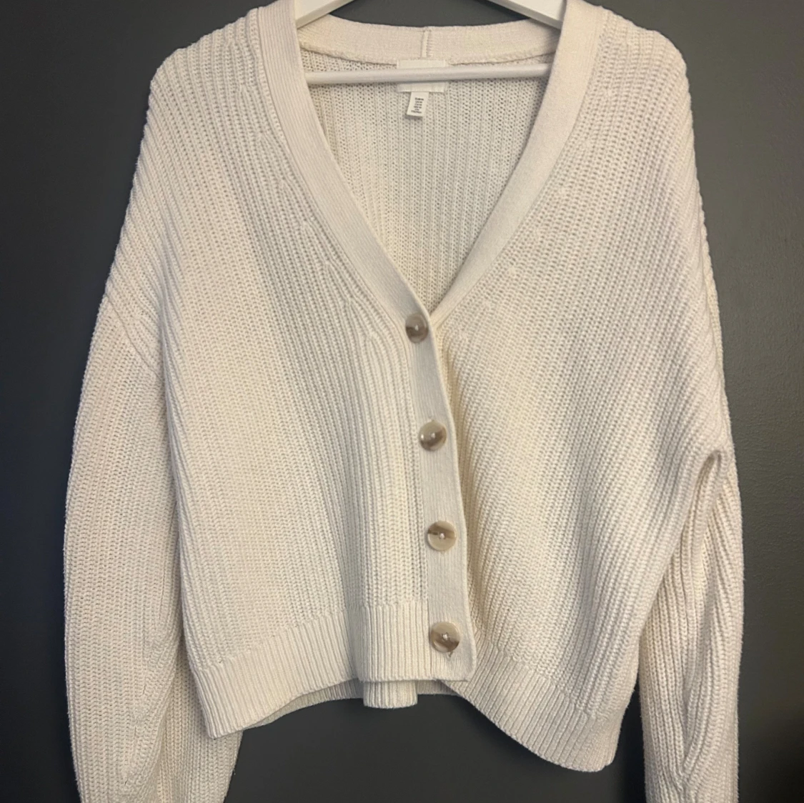 Vit stickad kofta från H&M