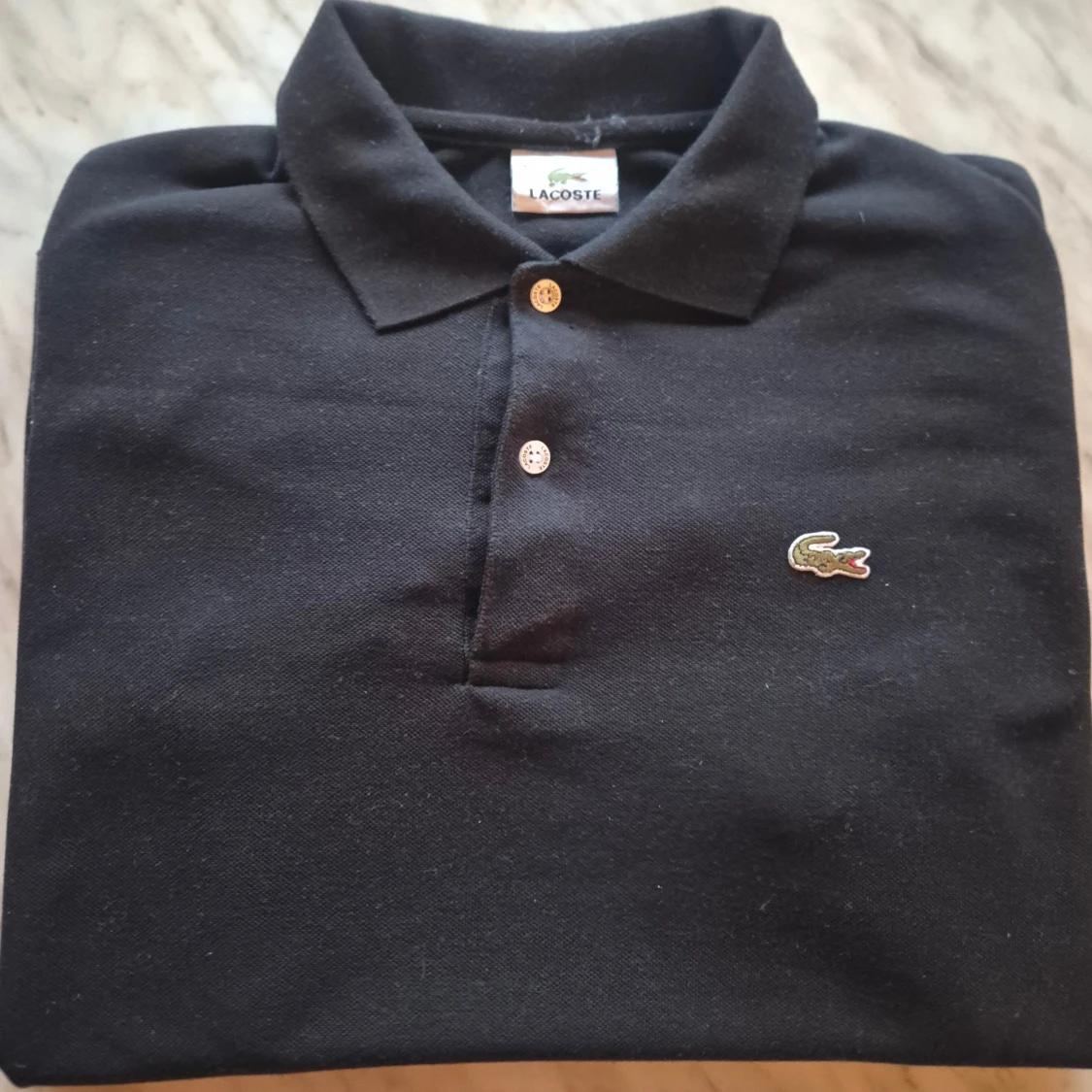 Svart pikétröja Lacoste