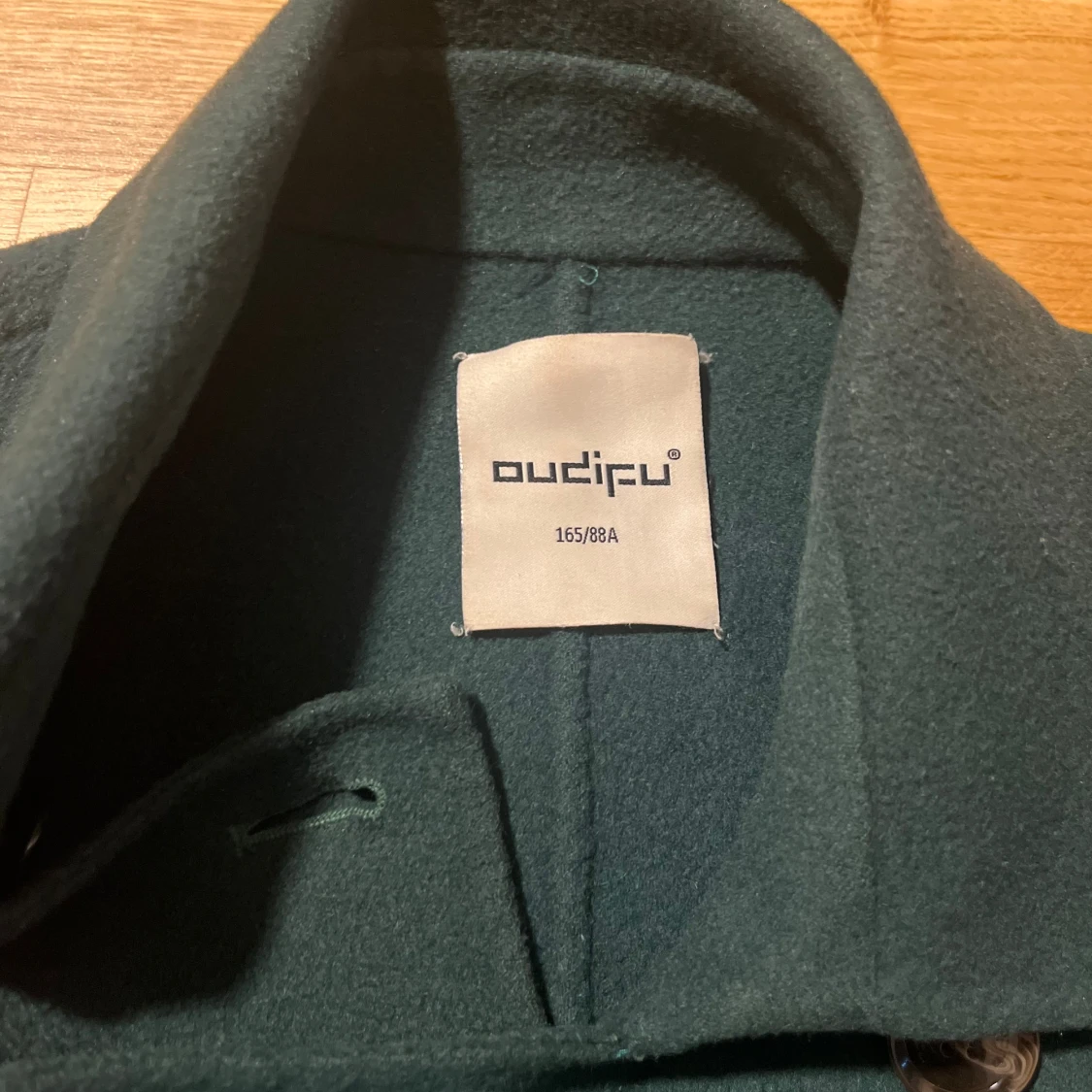 Mörkgrön skepparkappa från Oudifu - 2